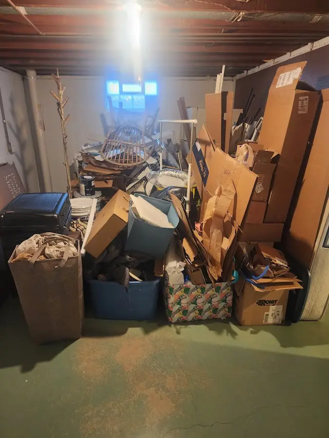 Roll-off dumpster container at job site for 2 Yard Dumpster Rental in West DeLand